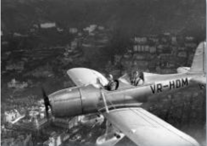 在維多利亞城上空翱翔的萊恩ST-M型飛機｜A Ryan ST-M Soars above Victoria City, 1947